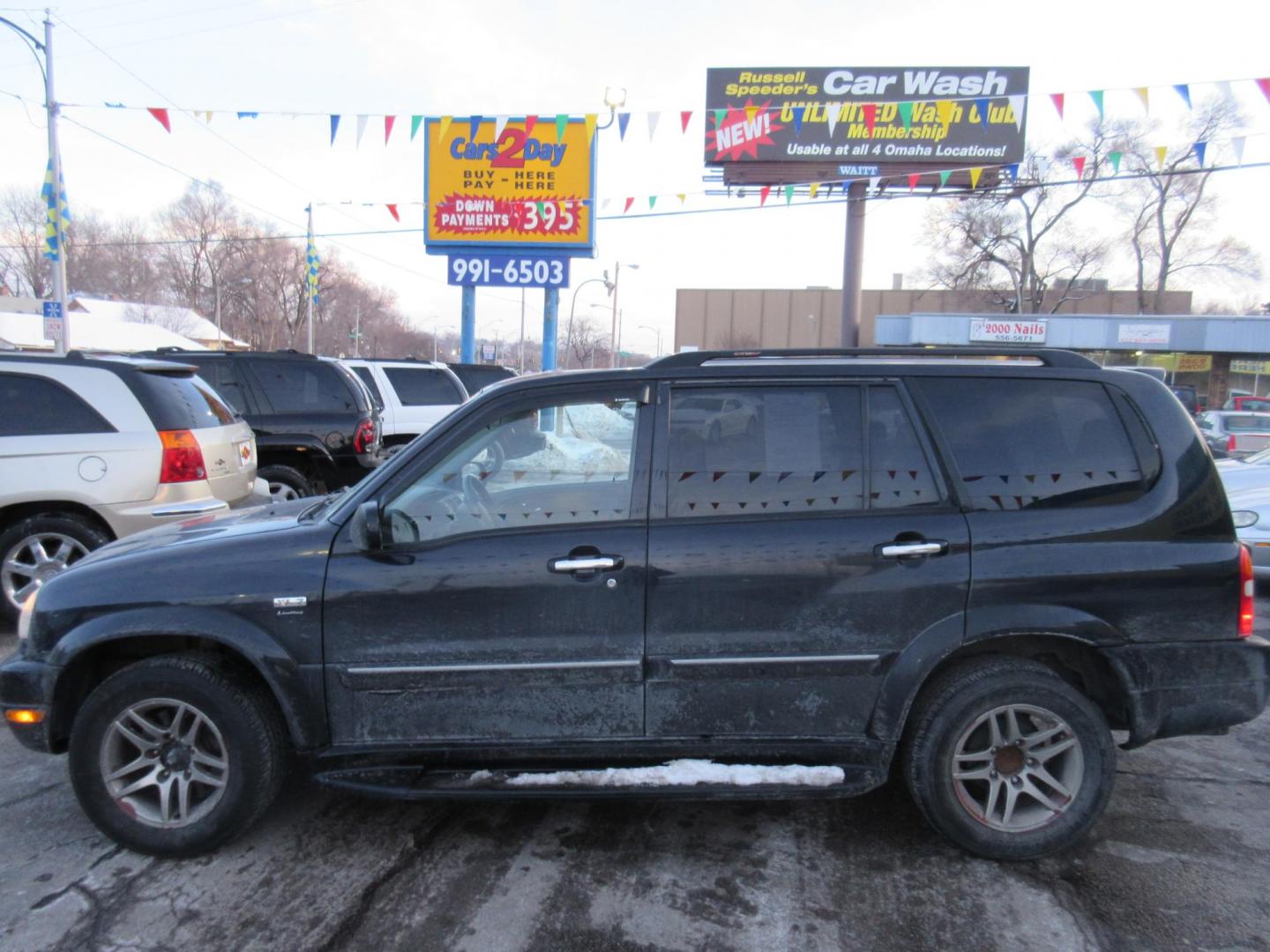 2002 Suzuki XL-7 Limited 4WD (JS3TX92V224) with an 2.7L V6 DOHC 24V engine, 4-Speed Automatic Overdrive transmission, located at 1020 NW Radial Hwy, Omaha, NE, 68132, (402) 991-6503, 41.269718, -95.983231 - Photo#0